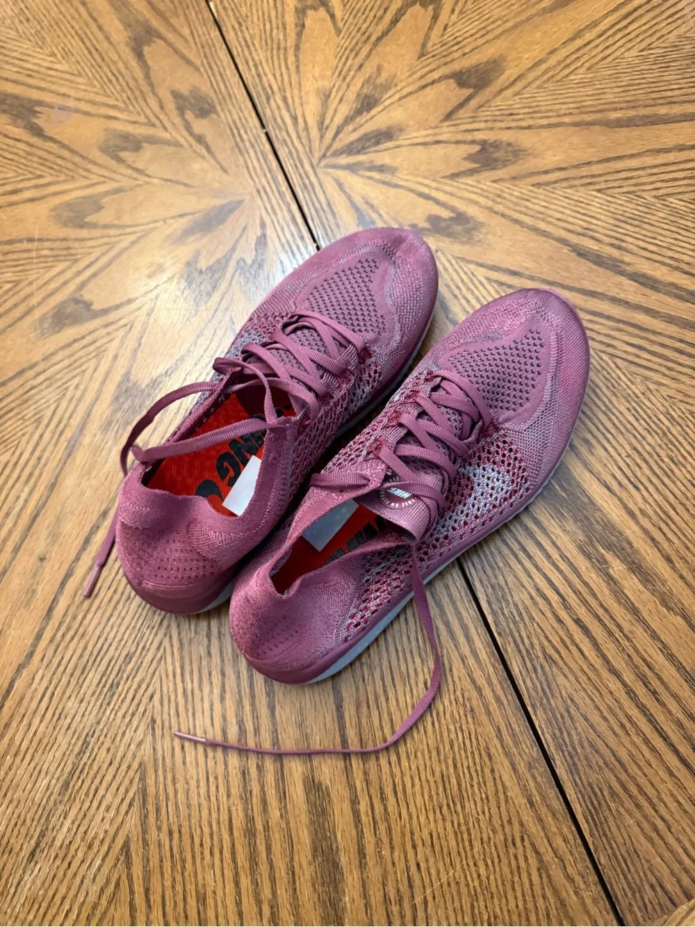 Nike Burgundy Knit Slip-On Sneakers with Bright Orange Insole